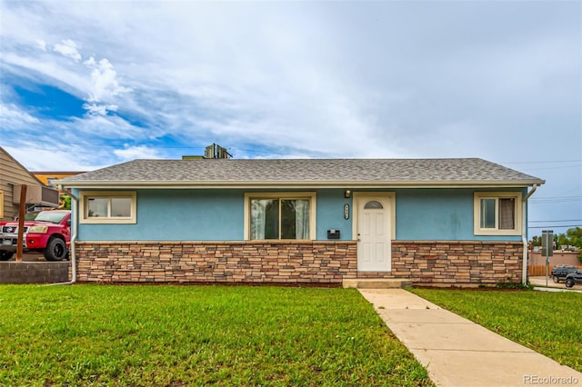5001 W Nevada Pl, Denver, CO 80219 - ranch-style home featuring stucco siding, stone siding, and a front lawn