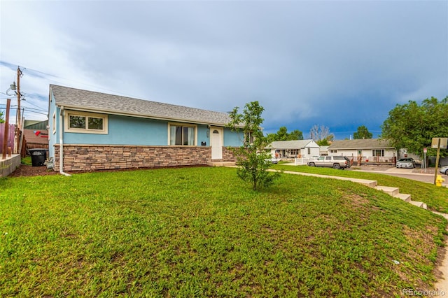 5001 W Nevada Pl, Denver, CO 80219 - ranch-style home featuring stucco siding and stone siding