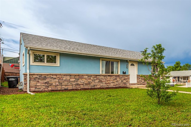 5001 W Nevada Pl, Denver, CO 80219 - ranch-style house featuring stucco siding, a front lawn, stone siding, and roof with shingles