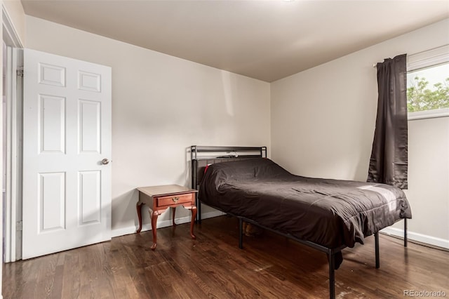 5001 W Nevada Pl, Denver, CO 80219 - bedroom with wood finished floors