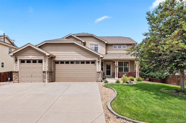 12942 Leyden St, Thornton, CO 80602 - view of front of property with a garage, brick siding, and driveway