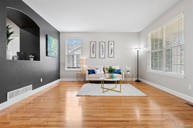 12942 Leyden St, Thornton, CO 80602 - living area with wood finished floors and baseboards