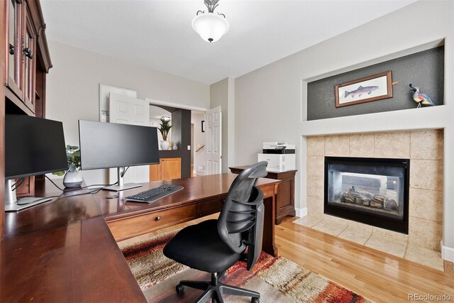 12942 Leyden St, Thornton, CO 80602 - office with wood finished floors and a tile fireplace