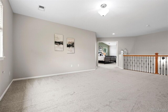 12942 Leyden St, Thornton, CO 80602 - carpeted empty room featuring baseboards and recessed lighting