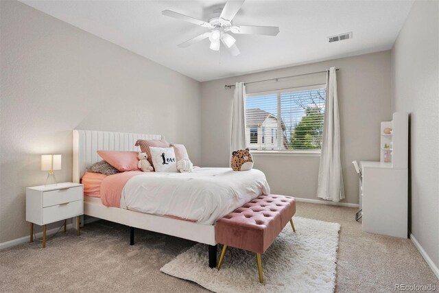 12942 Leyden St, Thornton, CO 80602 - carpeted bedroom with baseboards and ceiling fan