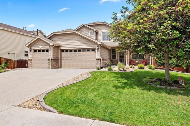 12942 Leyden St, Thornton, CO 80602 - view of front of house with brick siding, an attached garage, and concrete driveway
