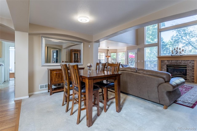 dining space featuring light hardwood / wood-style floors and washer / dryer