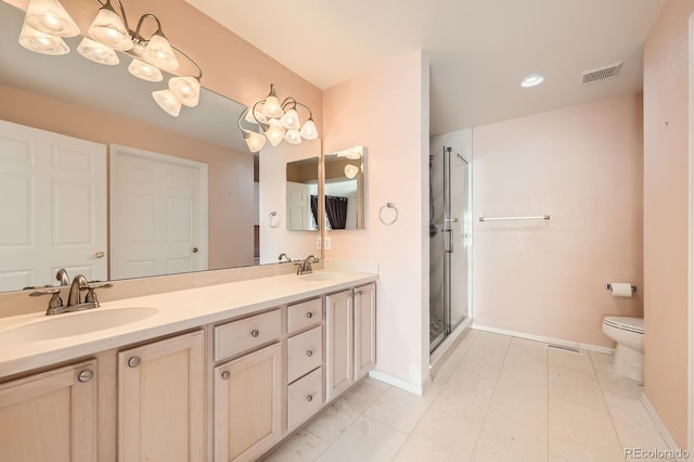 7774 S Biloxi Way, Aurora, CO 80016 - bathroom with double vanity, a stall shower, and recessed lighting