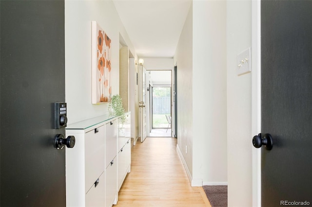 85 S Flower St, Lakewood, CO 80226 - hallway featuring light wood-style flooring and baseboards