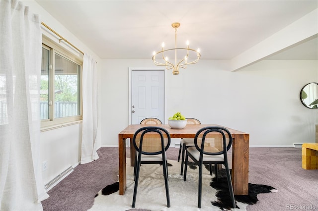 85 S Flower St, Lakewood, CO 80226 - dining space featuring carpet floors, a chandelier, and baseboards
