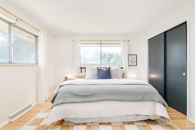 85 S Flower St, Lakewood, CO 80226 - bedroom featuring wood finished floors and baseboards