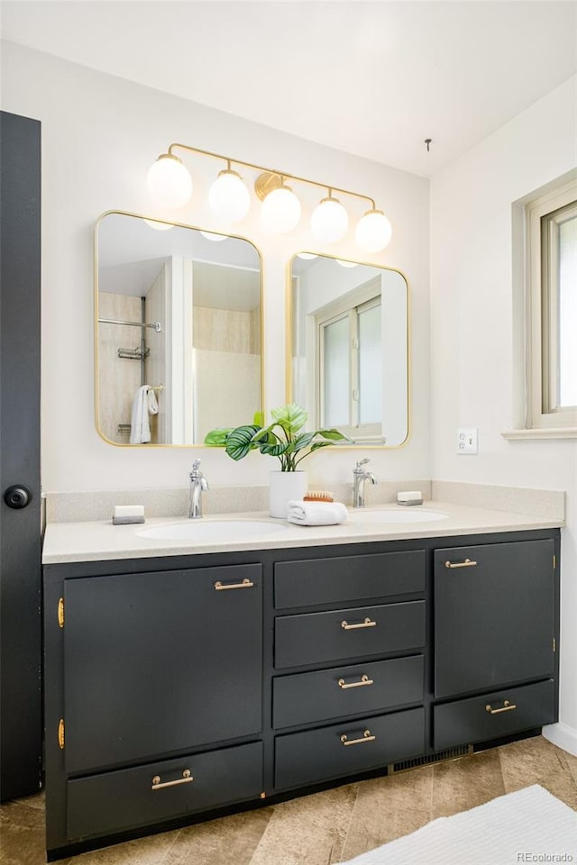 85 S Flower St, Lakewood, CO 80226 - bathroom featuring double vanity