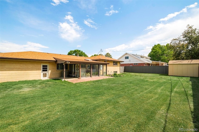 85 S Flower St, Lakewood, CO 80226 - rear view of house with a patio area
