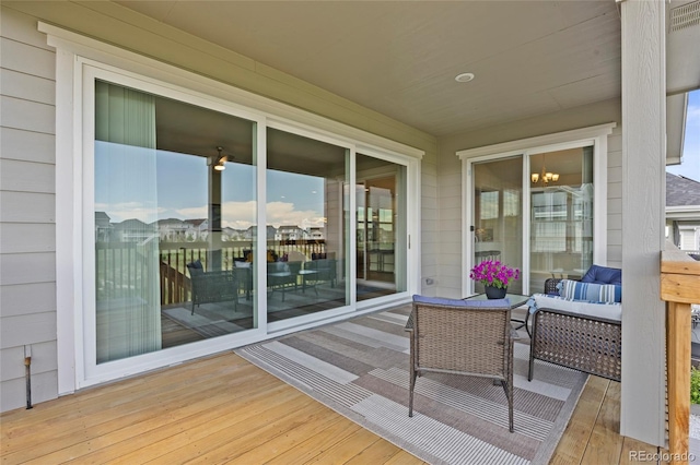 7166 S Vandriver Way, Aurora, CO 80016 - wooden deck featuring outdoor lounge area