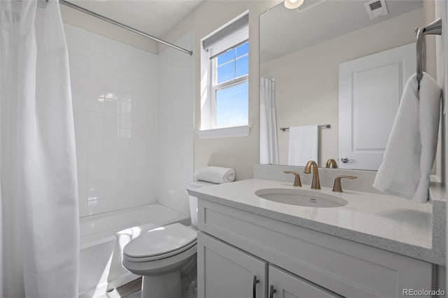 7166 S Vandriver Way, Aurora, CO 80016 - bathroom with vanity and shower / bath combo with shower curtain