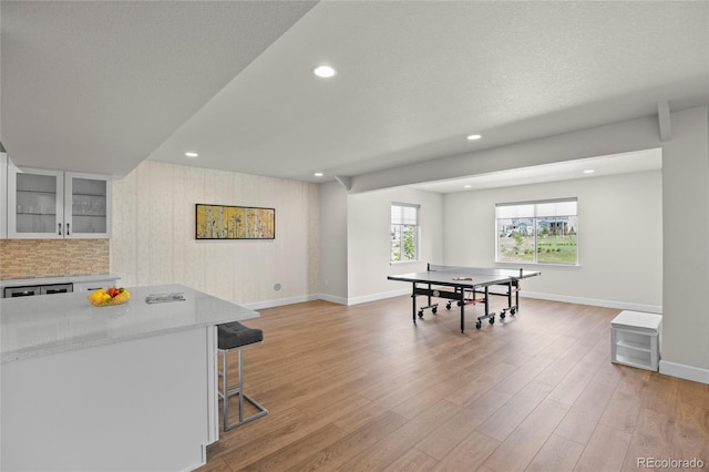 7166 S Vandriver Way, Aurora, CO 80016 - recreation room with light wood-style floors and recessed lighting