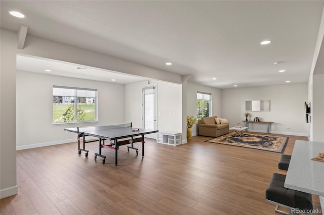 7166 S Vandriver Way, Aurora, CO 80016 - recreation room featuring wood finished floors and recessed lighting