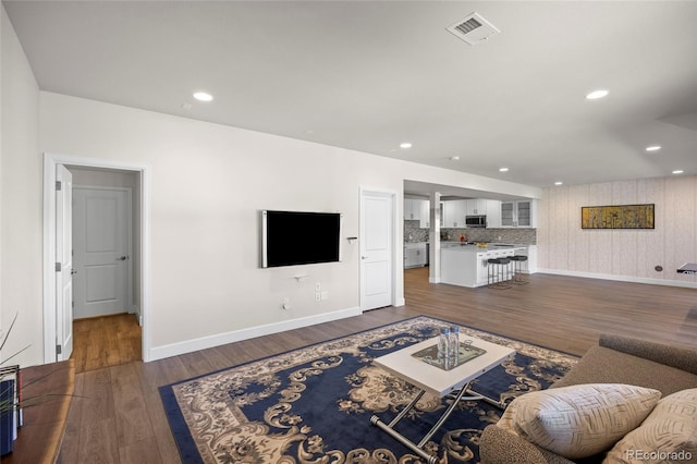 7166 S Vandriver Way, Aurora, CO 80016 - living room featuring wood finished floors and recessed lighting