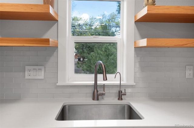 1805 Cheyenne Blvd, Colorado Springs, CO 80906 - interior details featuring a sink, open shelves, and tasteful backsplash