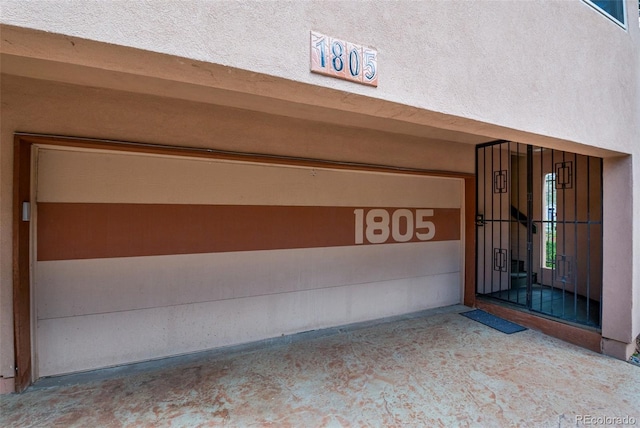 1805 Cheyenne Blvd, Colorado Springs, CO 80906 - doorway to property featuring stucco siding and an attached garage