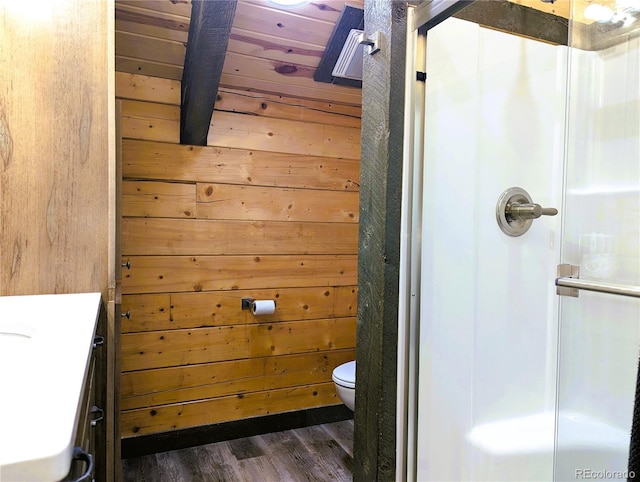 1857 Sturm Ln, Fort Garland, CO 81133 - full bathroom featuring wooden walls, wood finished floors, a shower with door, vanity, and wood ceiling