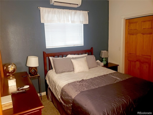 carpeted bedroom featuring a wall mounted AC