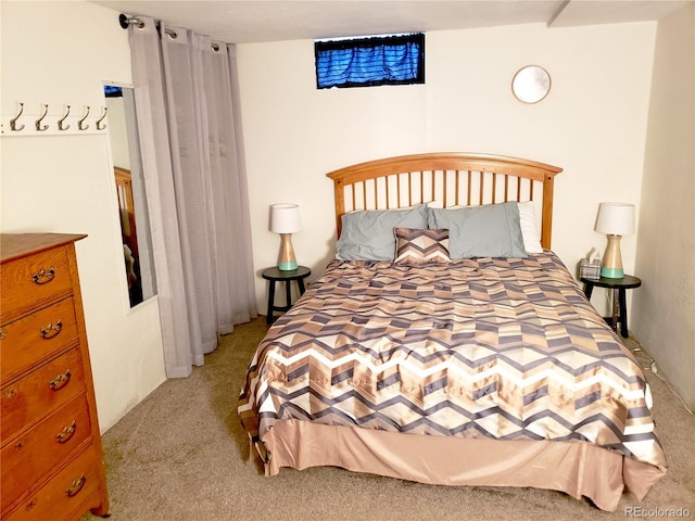 bedroom with light carpet