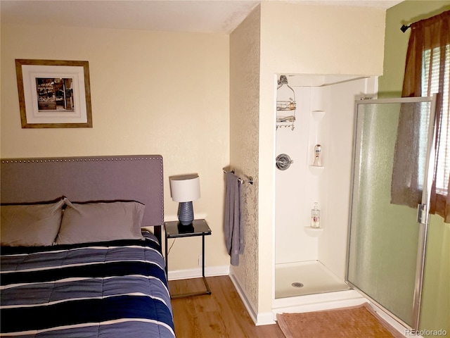 bedroom featuring light wood-type flooring