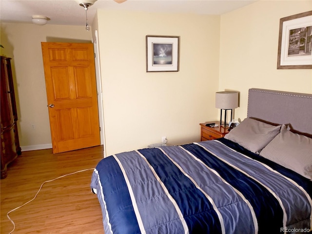 bedroom with light wood-type flooring