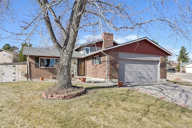 view of front of house with a front lawn, brick siding, a chimney, and driveway