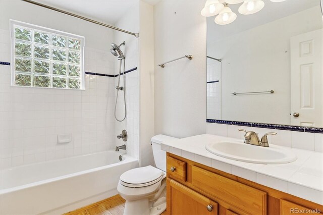2330 S Salem Cir, Aurora, CO 80014 - full bathroom with vanity, bathing tub / shower combination, and a chandelier