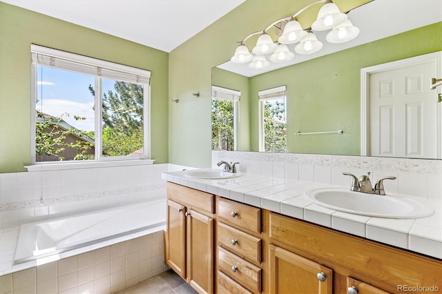 2330 S Salem Cir, Aurora, CO 80014 - full bath featuring double vanity, a bath, plenty of natural light, and tile patterned flooring