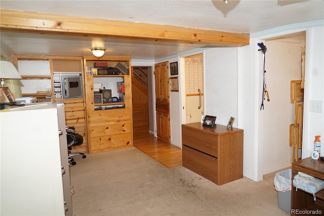 interior space featuring light colored carpet