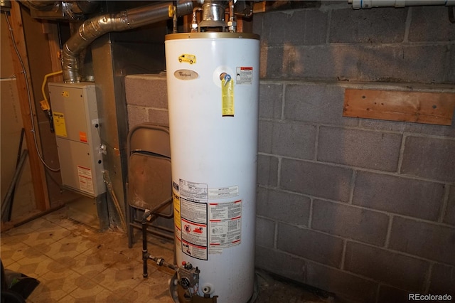 utility room featuring gas water heater