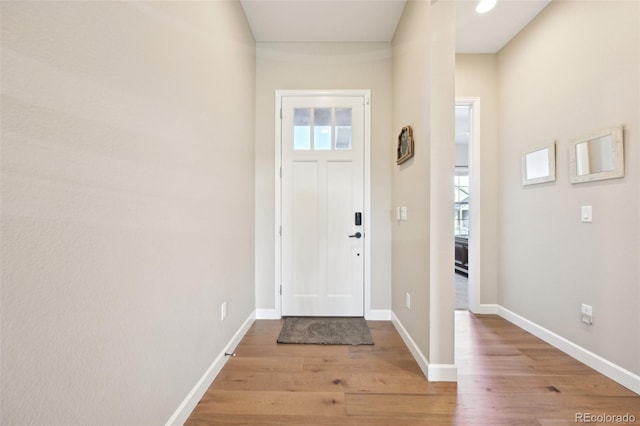 6980 S Yantley Ct, Aurora, CO 80016 - entrance foyer with wood finished floors and baseboards