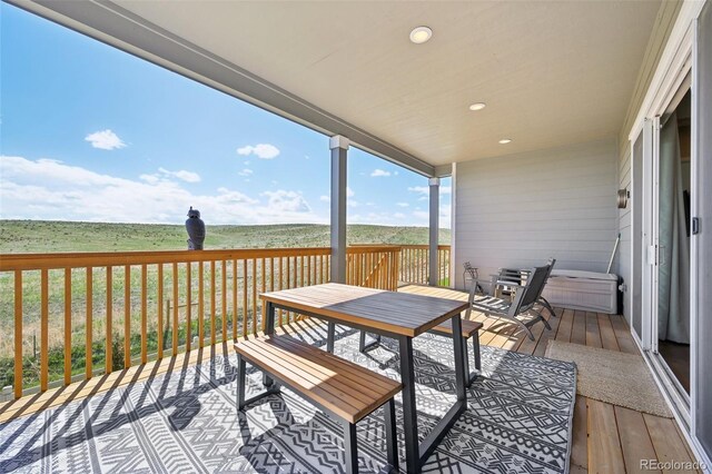 6980 S Yantley Ct, Aurora, CO 80016 - deck featuring a water view and outdoor dining space
