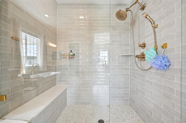 6980 S Yantley Ct, Aurora, CO 80016 - full bathroom featuring a tile shower