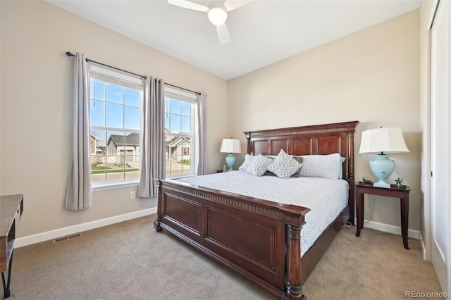 6980 S Yantley Ct, Aurora, CO 80016 - bedroom featuring baseboards, light carpet, and ceiling fan