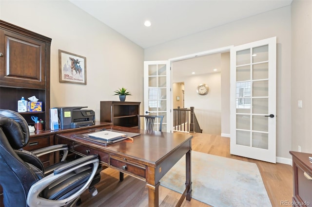 6980 S Yantley Ct, Aurora, CO 80016 - office featuring light wood-style floors, french doors, and baseboards