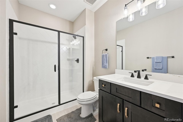 6980 S Yantley Ct, Aurora, CO 80016 - bathroom featuring a stall shower, toilet, vanity, and wood finished floors