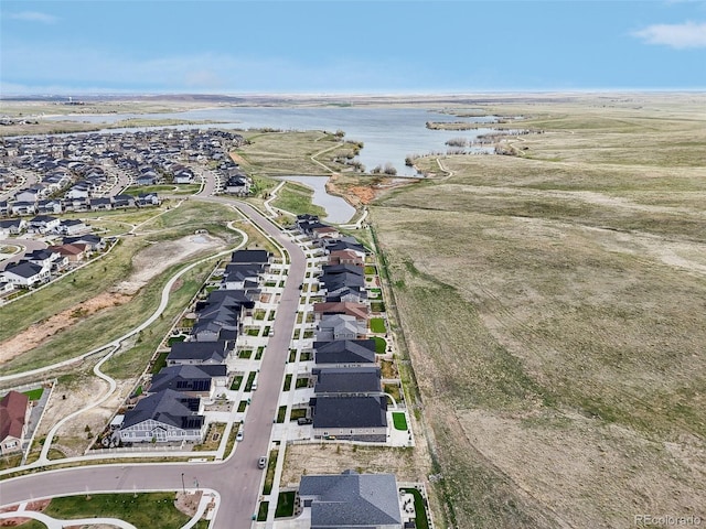 6980 S Yantley Ct, Aurora, CO 80016 - aerial overview of property's location with a nearby body of water and nearby suburban area
