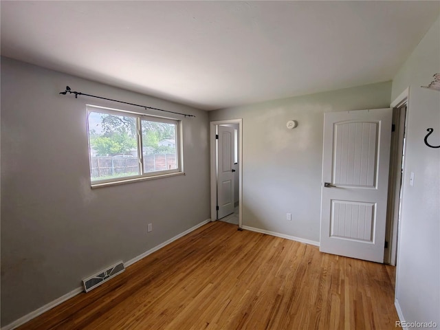 7409 Pierce St, Arvada, CO 80003 - unfurnished room featuring light wood finished floors and baseboards