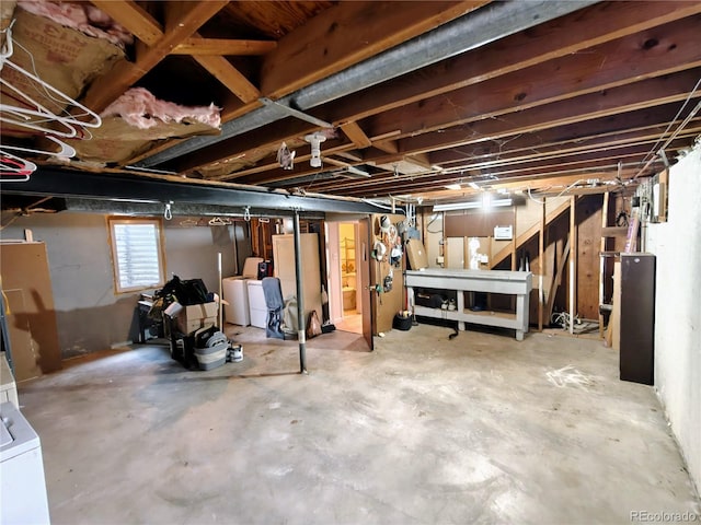 7409 Pierce St, Arvada, CO 80003 - below grade area with washer / dryer