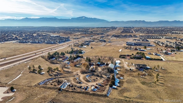 bird's eye view with a mountain view