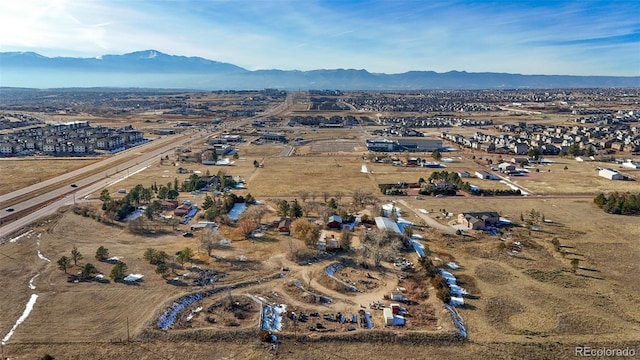 bird's eye view with a mountain view