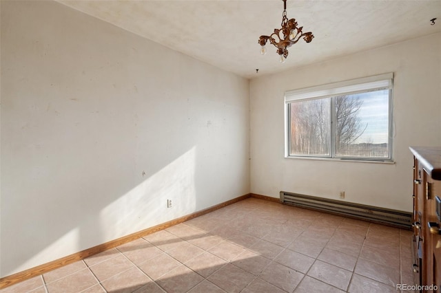 unfurnished room featuring a notable chandelier, light tile patterned floors, and baseboard heating