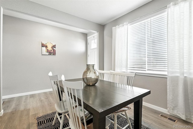 1670 Vantage Pkwy, Berthoud, CO 80513 - dining area featuring light wood finished floors and baseboards