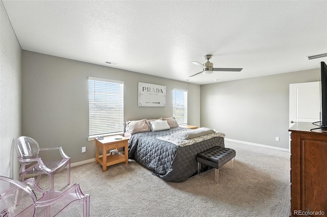 1670 Vantage Pkwy, Berthoud, CO 80513 - bedroom with carpet floors, a ceiling fan, and a textured ceiling