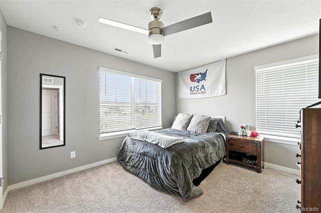 1670 Vantage Pkwy, Berthoud, CO 80513 - bedroom featuring light colored carpet and a ceiling fan