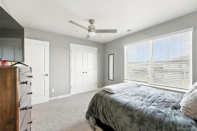 1670 Vantage Pkwy, Berthoud, CO 80513 - carpeted bedroom with a closet and ceiling fan
